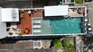 Flats a poucos metros do mar - Get One