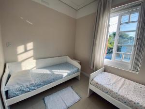 Aparts Ilha Centro-casa 2 qtos e casa 1 qto mezanino