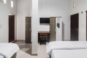 RedDoorz at Qaireen Living Jambi