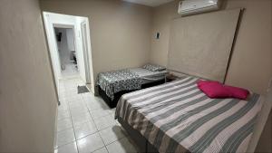 Casa praticamente em frente a praia - Caraguatatuba