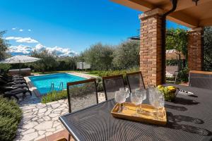 Bezaubernde Villa mit Meerblick, Jacuzzi, Babybett, Grill