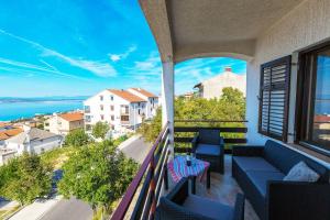 Beschauliches Apartment nur 650 Meter zum Strand mit Fitnessraum, Meerblick, Grill