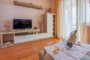 Beschauliches Apartment nur 650 Meter zum Strand mit Fitnessraum, Meerblick, Grill