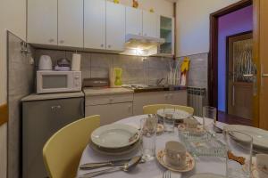 Beschauliches Apartment nur 650 Meter zum Strand mit Fitnessraum, Meerblick, Grill