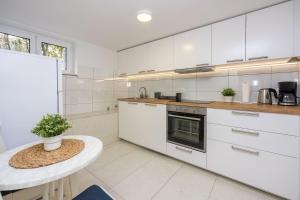 Modernes Apartment nur 300 Meter zum Strand mit Grillplatz und Privatparkplatz