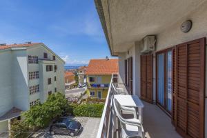 Cozy Apartment mit Meerblick, Privatparkplatz, Garten, Klima, WiFi