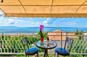 Lichtdurchflutetes Apartment nur 500 Meter zum Strand mit Meerblick, Grill, Parkplatz, WiFi