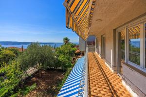 Komfortables Apartment nur 400 Meter zum Strand mit Meerblick, Grillbereich, Klima