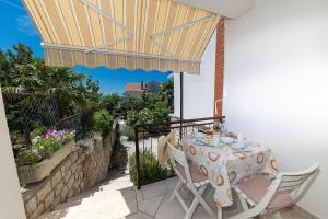 Malerisches Apartment nur 150 Meter zum Strand mit Privatparkplatz, Grill, Klima