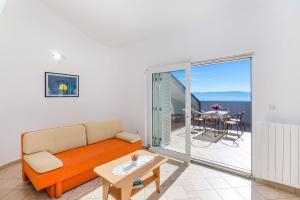 Traumhaftes Apartment mit beeindruckendem Meerblick und mediterranem Garten