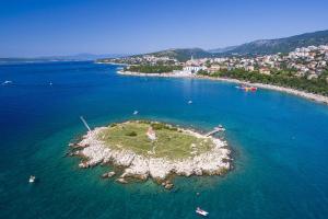 Beschauliches Apartment nur 300 Meter zum Strand mit Garten und Grill