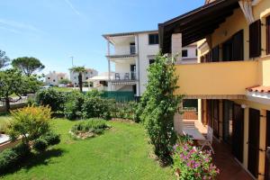 Charmantes Apartment nur 700 Meter zum Strand mit Garten, Waschmaschine, WiFi