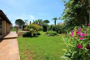 Charmantes Apartment nur 700 Meter zum Strand mit Garten, Waschmaschine, WiFi