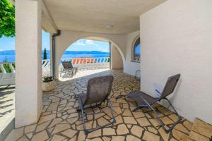 Malerisches Apartment mit traumhaften Meerblick, Grillplatz, Garten, Waschmaschine