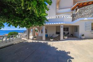 Malerisches Apartment mit traumhaften Meerblick, Grillplatz, Garten, Waschmaschine