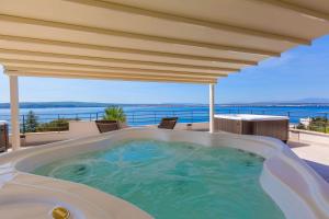 Beeindruckendes Apartment nur 100 Meter zum Strand mit Sauna, Whirlpool, Meerblick