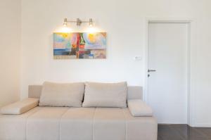 Mediterranes Apartment nur 300 Meter zum Strand mit Privatparkplatz, Grill, Klima