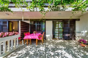 Romantisches Apartment mit mediterraner Terrasse, Privatparkplatz und Grillbereich