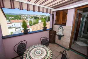 Charmantes Apartment nur 80 Meter zum Strand mit romantischen Balkon