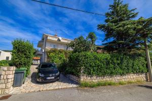 Idyllisches Apartment nur 300 Meter zum Strand mit Meerblick, Garten, Grill, Parkplatz