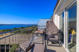 Atemberaubendes Apartment mit tollem Meerblick, Waschmaschine, Grillbereich