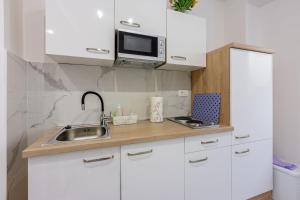 Zentrales Apartment nur 250 Meter zum Strand mit Privatparkplatz