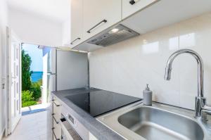 Bezauberndes Apartment nur 240 Meter zum Strand mit Meerblick, Grill, Klima