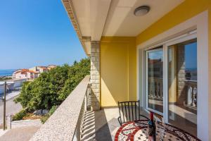 Cozy Apartment nur 800 Meter zum Strand mit Meerblick, Grill, Privatparkplatz