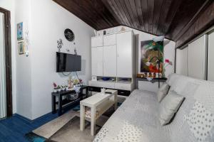 Dachgeschoss Apartment nur 450 Meter zum Sandstrand mit Meerblick und Klima