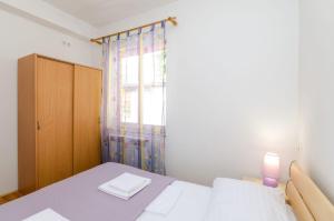 Liebevolles Apartment nur 500 Meter zum Strand mit Privatparkplatz, WiFi, Klima