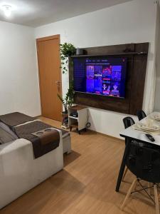 Apartamento ou quarto compartilhado - 7 minutos do AEROPORTO com Piscina