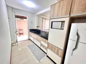 Apartamento em Bombinhas com Churrasqueira - 150m do Mar