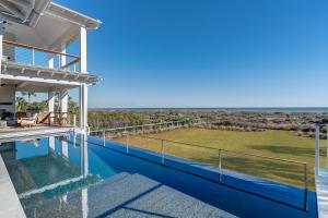 Brand New Custom Oceanfront home- Stunning views, 6 bd, pool, elevator