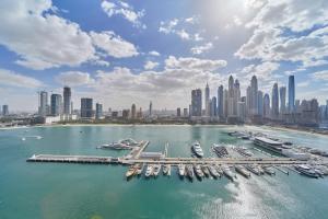 Elegant Beachfront 2BR at Palace Beach Residence