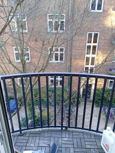 Familievenlig lejlighed på Vesterbro med central beliggenhed