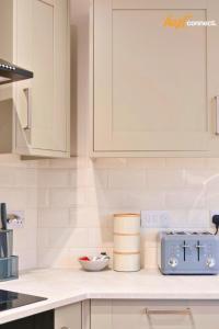 Comfy 1 Bed Airdrie Flat w Private Parking