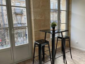 Appartement superbe avec Climatisation et belle pierre Bordelaise pour 2p