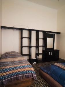 Hospedaje en habitación casa colonial centro histórico Puebla