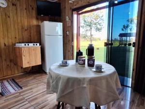 Cabana Cristal ll Campestre Em Sítio ll Wi-Fi Nômade Digital ll Táxi Fácil II Forno Microondas ll Quiosque Churrasqueira ll 6km da Estrada do Mar ll 8,1Km Prefeitura II 7,2Km UFRGS Litoral II 12km do Morro da Borrusia e das Praias Tramandai