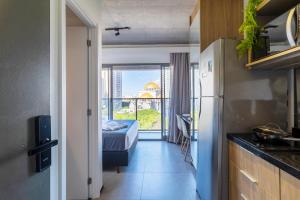 Vista incrível com piscina na cobertura e academia