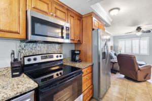 Updated 2nd Floor Unit by Pool - Only Steps to the Beach - Free WFii
