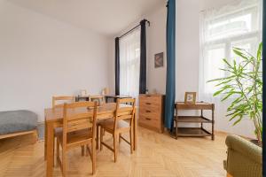 Chic Navy Studio with Balcony & Church View by Rentez