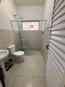 Casa no Pereque açu com churrasqueira e wi-fi