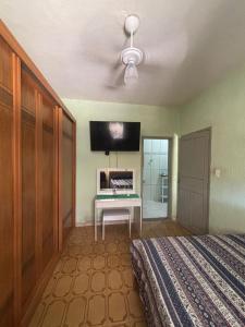 Casa no Pereque açu com churrasqueira e wi-fi