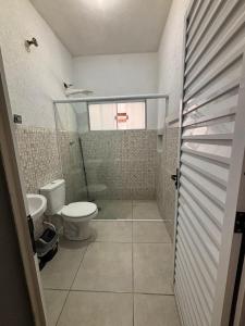 Casa no Pereque açu com churrasqueira e wi-fi