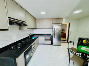 Alto padrão à beira-mar Varanda grande 4 quartos sendo 2 suites