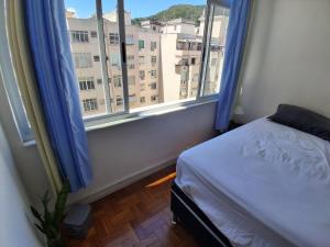 quiet beachfront room in shared apartment - quarto tranquilo num apartamento compartilhado em frente a praia
