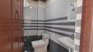 Hotel O KSR Guest Rooms