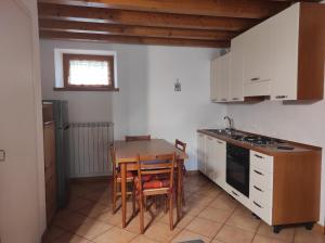 Grazioso appartamento con giardino e posto auto