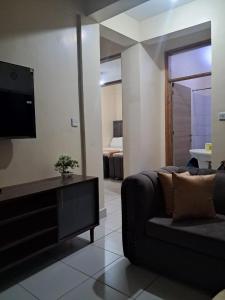 Cozy 2 BR with 3 Beds, AC & Hot Shower at Buxton Point Apartments Off RG Road Gate A